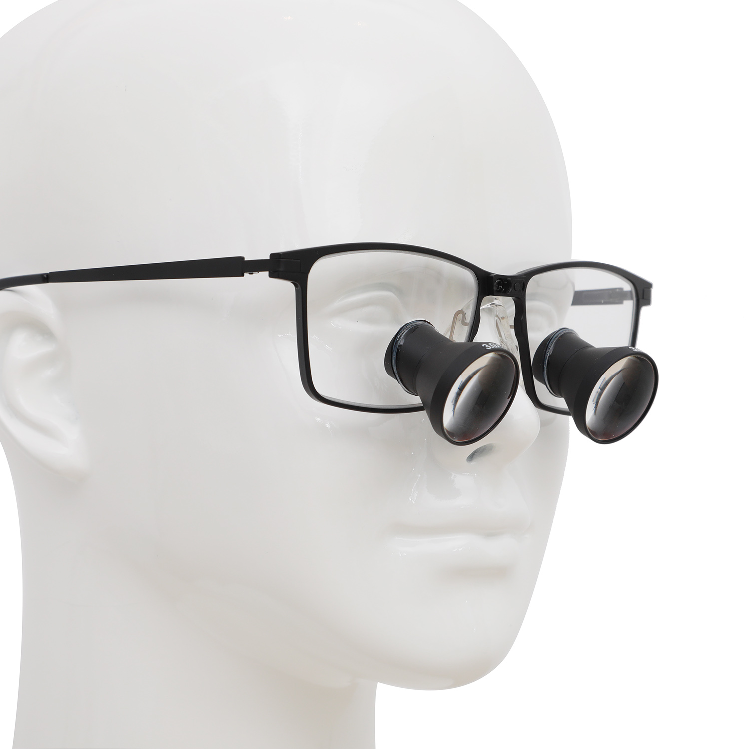 Black rectangular professional loupes shown on a display head